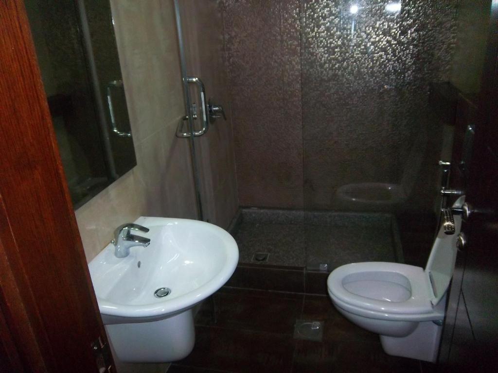 Aghadeer Hotel Ammán Szoba fotó