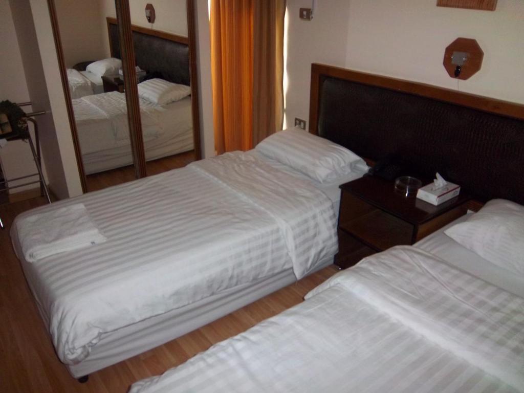Aghadeer Hotel Ammán Szoba fotó